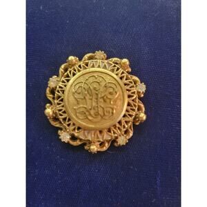 Vintage signed Florenza gold toned brooch with magnetic pin back